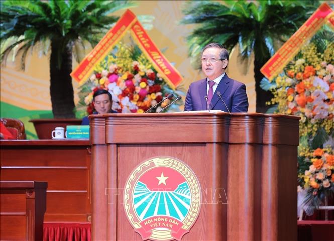 Đồng chí Lương Quốc Đoàn, Uỷ viên Trung ương Đảng, Chủ tịch Hội Nông dân Việt Nam trình bày Diễn văn khai mạc Đại hội. Ảnh: Hoàng Hiếu - TTXVN