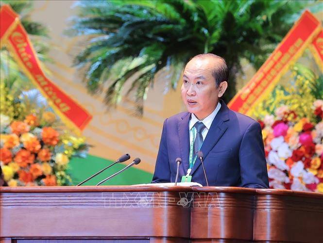 Phó Chủ tịch Thường trực Hội Nông dân Việt Nam Phan Như Nguyện trình bày Báo cáo tóm tắt kết quả thực hiện Nghị quyết Đại hội đại biểu toàn quốc Hội Nông dân Việt Nam lần thứ VIII, nhiệm kỳ 2023 - 2028. Ảnh: Hoàng Hiếu - TTXVN