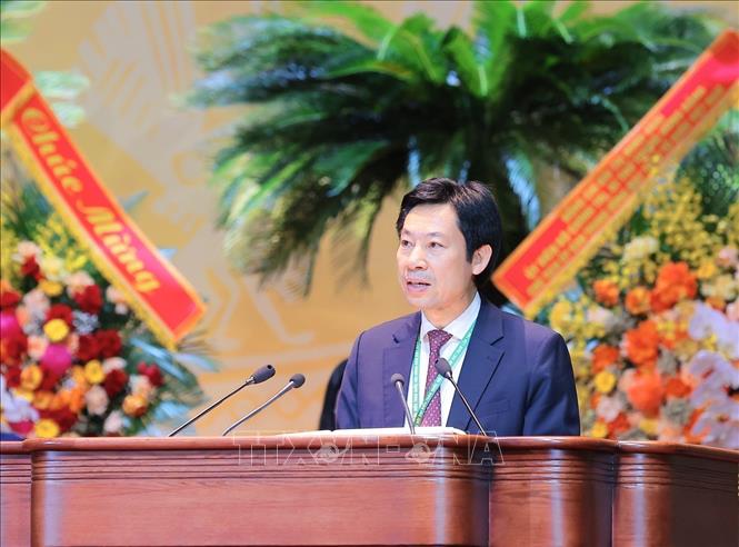 Phó Chủ tịch Hội Nông dân Việt Nam Nguyễn Xuân Định trình bày tham luận tại Đại hội. Ảnh: Hoàng Hiếu - TTXVN