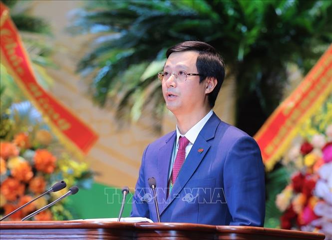 Phó Tổng giám đốc Ngân hàng Nông nghiệp và Phát triển nông thôn Đỗ Đức Thành trình bày tham luận. Ảnh: Hoàng Hiếu - TTXVN