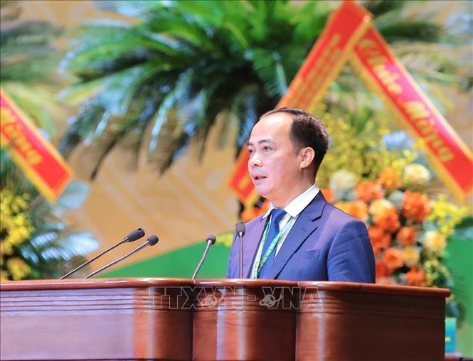 Phó Trưởng ban Công tác Nông dân Trung ương Hội Nông dân Việt Nam Nguyễn Hồng Hải thay mặt Tổ thư ký Đại hội đọc dự thảo Nghị quyết Đại hội. Ảnh: Hoàng Hiếu - TTXVN