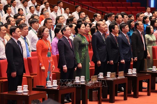 Đại biểu thực hiện nghi lễ chào cờ bế mạc Đại hội. Ảnh: Hoàng Hiếu - TTXVN