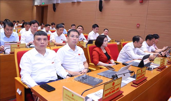 Các đại biểu dự phiên khai mạc kỳ họp thứ tư HĐND thành phố Hà Nội. Ảnh: Văn Điệp - TTXVN