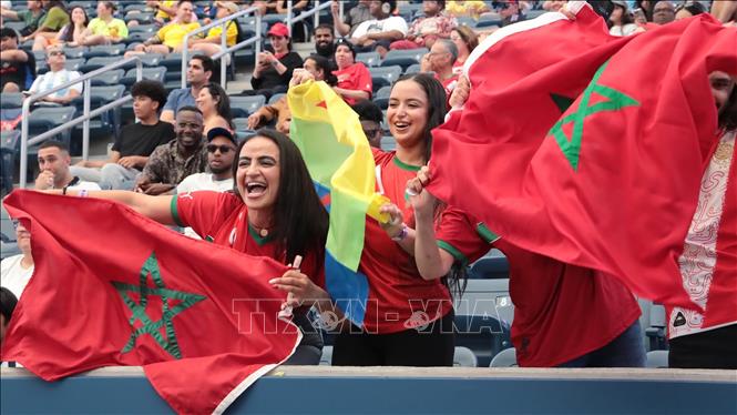 Cổ động viên Maroc vỡ òa niềm vui sau khi đội nhà ghi bàn mở tỷ số. Ảnh: Thanh Tuấn - PV TTXVN tại Mỹ