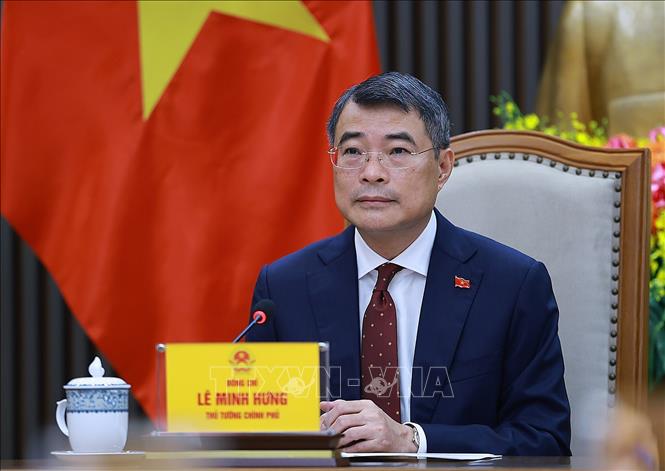 Thủ tướng Chính phủ Lê Minh Hưng điện đàm với Thủ tướng Trung Quốc Lý Cường. Ảnh: Dương Giang – TTXVN 