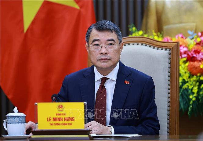 Thủ tướng Chính phủ Lê Minh Hưng điện đàm với Thủ tướng Trung Quốc Lý Cường. Ảnh: Dương Giang – TTXVN