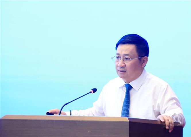 Ông Phan Đăng Phong, Viện trưởng Viện Nghiên cứu cơ khí (Bộ Công Thương) trình bày tham luận tại hội thảo. Ảnh: Tuấn Anh - TTXVN