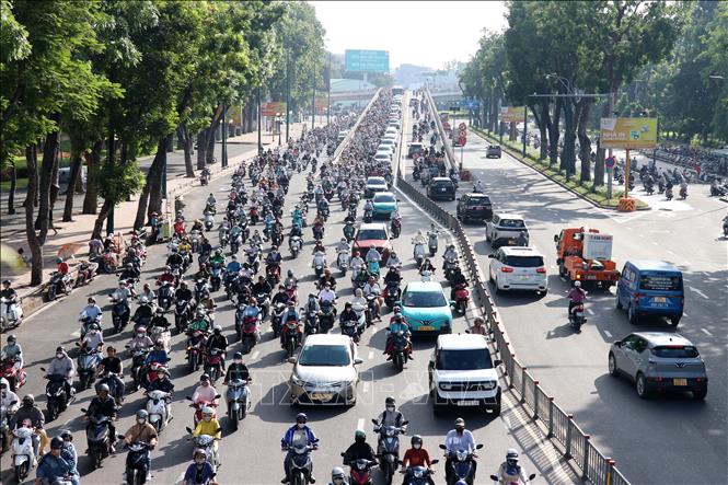 Chuyển đổi phương tiện giao thông sử dụng điện, năng lượng xanh tại TP. Hồ Chí Minh đã có sự chuyển biến rõ rệt. Ảnh: Tiến Lực - TTXVN