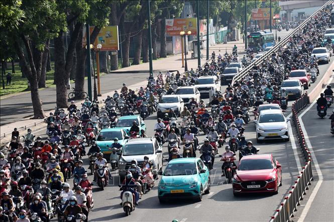 Chuyển đổi phương tiện giao thông sử dụng điện, năng lượng xanh tại TP. Hồ Chí Minh đã có sự chuyển biến rõ rệt. Ảnh: Tiến Lực - TTXVN