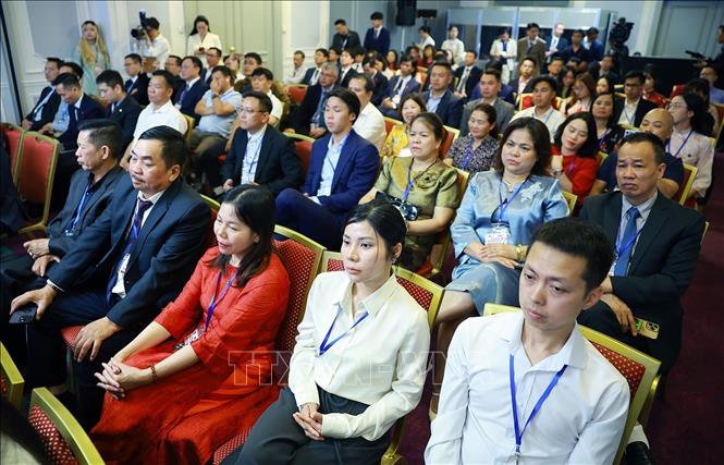 Cộng đồng người Việt Nam tại Liên bang Nga tham dự buổi gặp. Ảnh: Dương Giang - TTXVN   