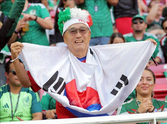 Cổ động viên đội tuyển Hàn Quốc. Ảnh: YONHAP/TTXVN