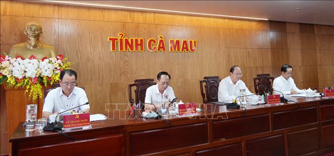 Lãnh đạo Ban Chỉ đạo thúc đẩy tăng trưởng tổng sản phẩm trong tỉnh (GRDP) tỉnh Cà Mau điều hành cuộc họp. Ảnh: Tuấn Kiệt – TTXVN