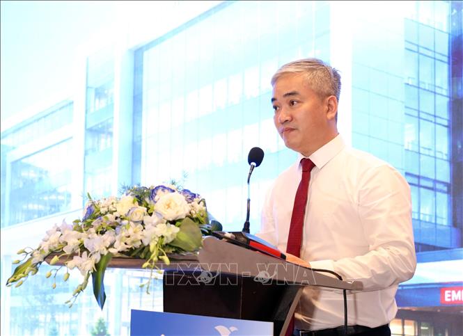 Tổng Biên tập Báo Sức khỏe và Đời sống Trần Tuấn Linh phát biểu khai mạc tại hội thảo. Ảnh: Trần Lê Lâm - TTXVN 