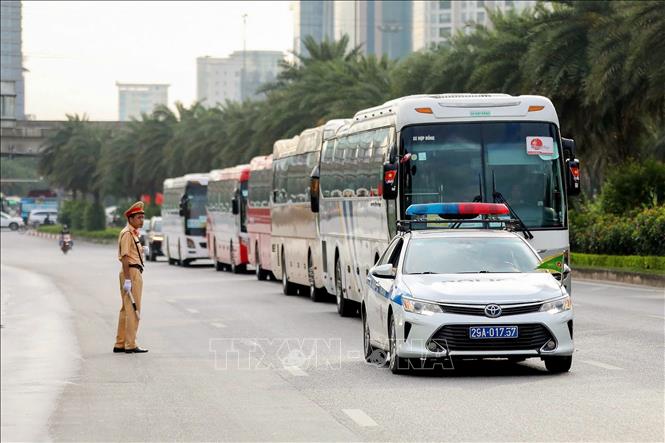 Cảnh sát giao thông Hà Nội phân luồng, điều tiết giao thông tại khu vực Trung tâm Hội nghị Quốc gia, ngày 24/6/2026. Ảnh: TTXVN phát