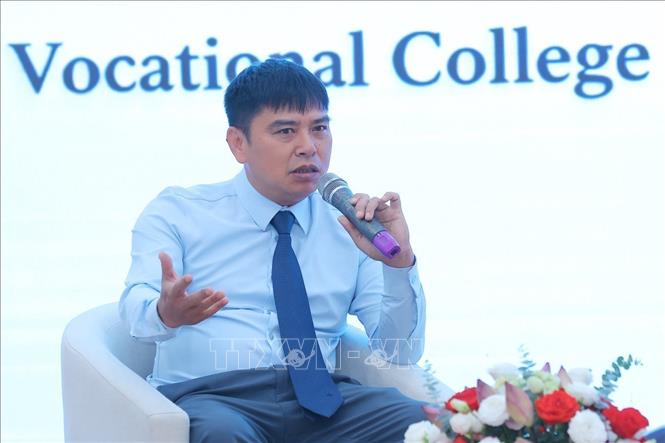 Phó Cục trưởng Cục giáo dục Nghề nghiệp (Bộ Giáo dục và Đào tạo) Phạm Vũ Quốc Bình tham gia thảo luận. Ảnh: Hoàng Hiếu - TTXVN