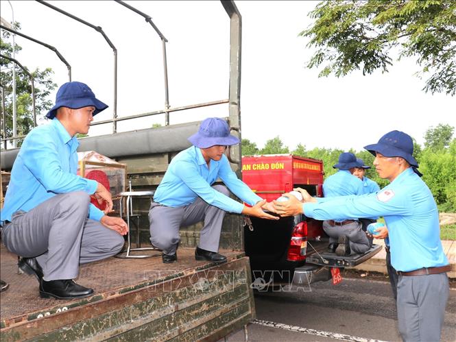 Lễ đón hài cốt liệt sĩ quân tình nguyện và chuyên gia Việt Nam anh dũng hy sinh tại Campuchia về nước. Ảnh: K GỬIH- TTXVN