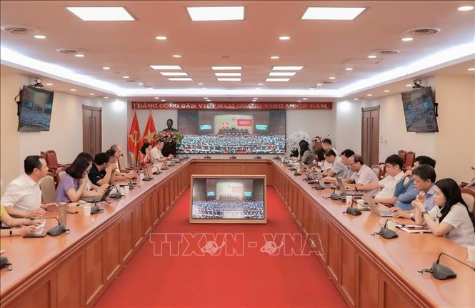 Đại biểu tham dự hội nghị trực tuyến tại điểm cầu Thông tấn xã Việt Nam. Ảnh: Phan Phương - TTXVN