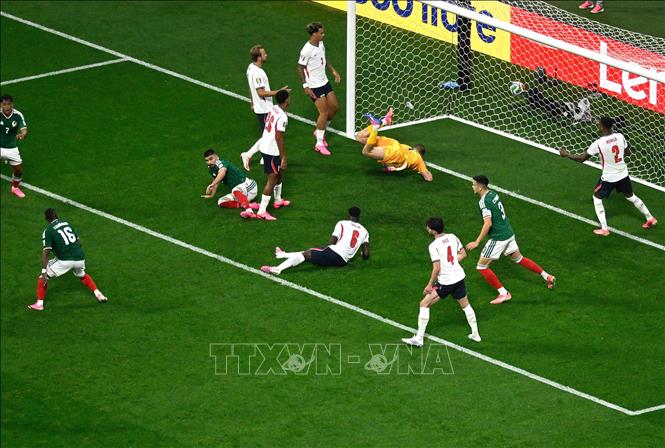 Cầu thủ Jude Bellingham ghi bàn thắng vào lưới đội tuyển Mexico. Ảnh: THX/TTXVN phát