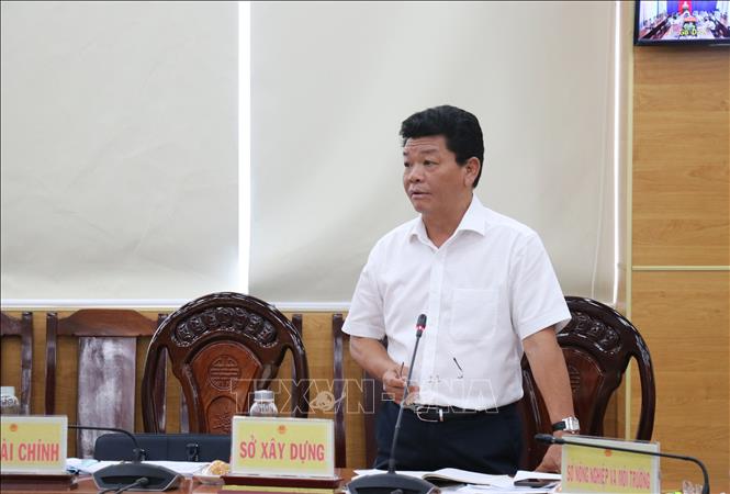 Lãnh đạo các sở, ngành, địa phương tham dự hội nghị, thảo luận các giải pháp thúc đẩy giải ngân vốn đầu tư công và thực hiện mục tiêu tăng trưởng GRDP hai con số trong năm 2026. Ảnh: Bùi Giang - TTXVN