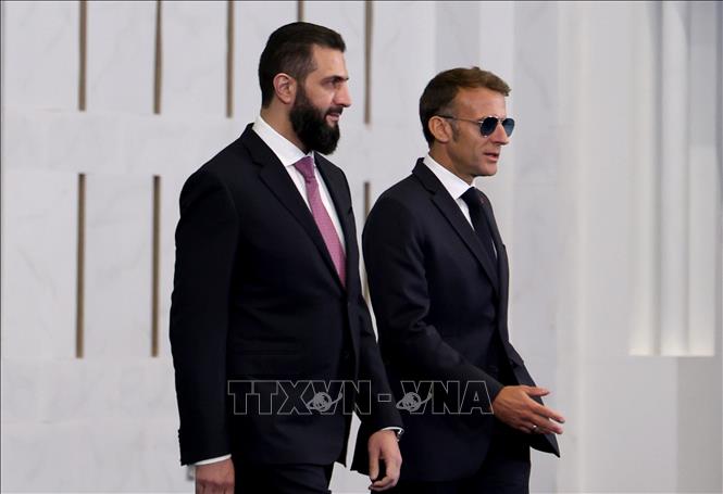 Tổng thống Syria Ahmad al-Sharaa và Tổng thống Pháp Emmanuel Macron tại cuộc gặp ở Damascus ngày 7/7/2026. Ảnh: THX/TTXVN phát