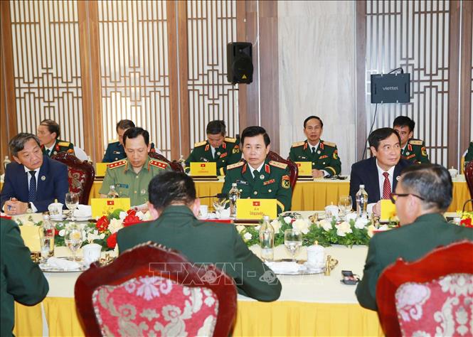 Các thành viên Quốc phòng hai nước tại hội đàm. Ảnh: Trọng Đức - TTXVN