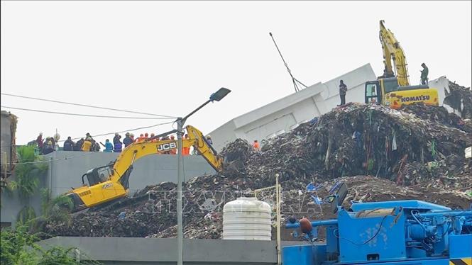 Hiện trường vụ sạt lở tại nhà máy điện rác ở ngoại ô thành phố Pune, miền Tây Ấn Độ. Ảnh: ANI/TTXVN phát
