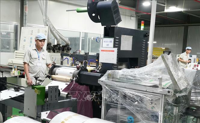 Đẩy mạnh sản xuất các sản phẩm công nghiệp chế biến, chế tạo để hướng tới mục tiêu tăng trưởng cả năm từ 12,5% đến 13%. Ảnh: Đồng Thúy - TTXVN 