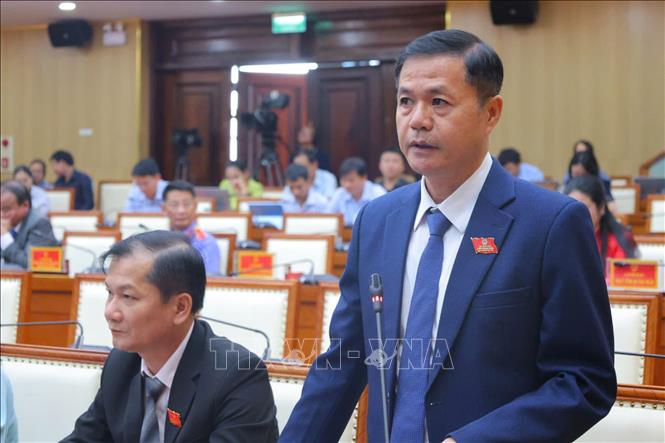 Các đại biểu nêu ý kiến tại phiên chất vấn và trả lời chất vấn. Ảnh: Cao Nguyên - TTXVN