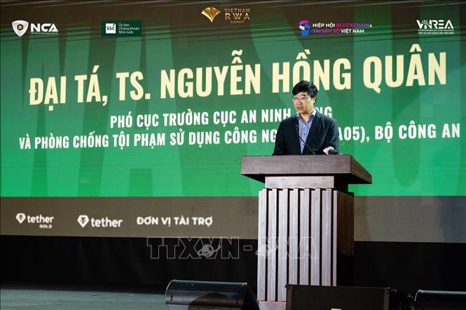 Đại tá Nguyễn Hồng Quân, Phó Cục trưởng A05, Bộ Công an phát biểu tại hội nghị. Ảnh: Hoàng Vân - TTXVN