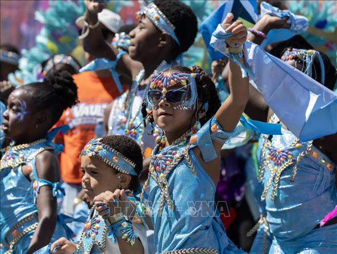 Các em nhỏ tham gia cuộc diễu hành hóa trang tại Toronto, Canada, ngày 19/7/2026. Ảnh: THX/TTXVN phát