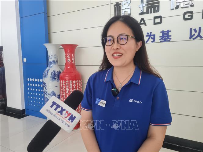 Bà Hỗ Thục Quân, Tổng Giám đốc Công ty Thương mại Quốc tế thuộc Tập đoàn Gerui De nhận định việc tăng cường hợp tác giữa doanh nghiệp hai nước sẽ thúc đẩy kết nối chuỗi cung ứng khu vực. Ảnh: Quang Hưng-PV TTXVN tại Trung Quốc