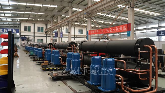 New energy and manufacturing companies in China are particularly interested in the Vietnamese market. VNA Photo: Quang Hưng