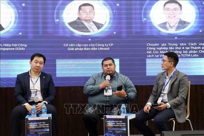 Chuyên gia thảo luận tại Diễn đàn hợp tác Việt Nam – Singapore về công nghiệp bán dẫn năm 2026. Ảnh: Tiến Lực - TTXVN