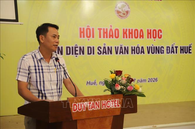 Đại biểu trình bày tham luận tại Hội thảo. Ảnh: Mai Trang- TTXVN 