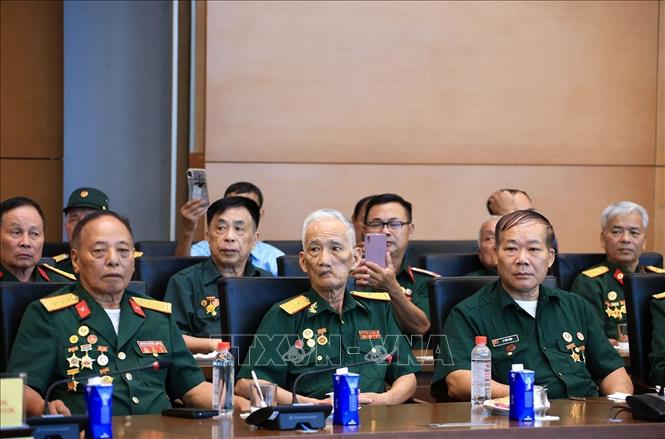 Các đại biểu Người có công với Cách mạng tiêu biểu tại buổi gặp mặt. Ảnh: Tuấn Anh - TTXVN