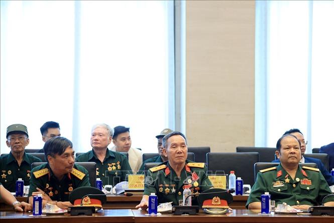 Các đại biểu Người có công với Cách mạng tiêu biểu tại buổi gặp mặt. Ảnh: Tuấn Anh - TTXVN