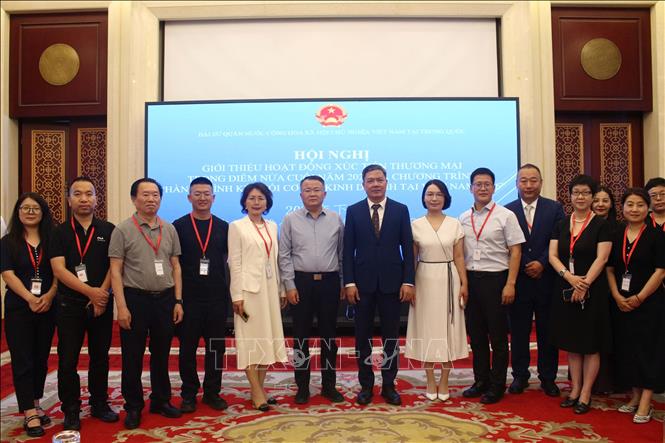 Các đại biểu chụp ảnh lưu niệm tại Hội nghị. Ảnh: Hải Yến - PV TTXVN tại Trung Quốc
