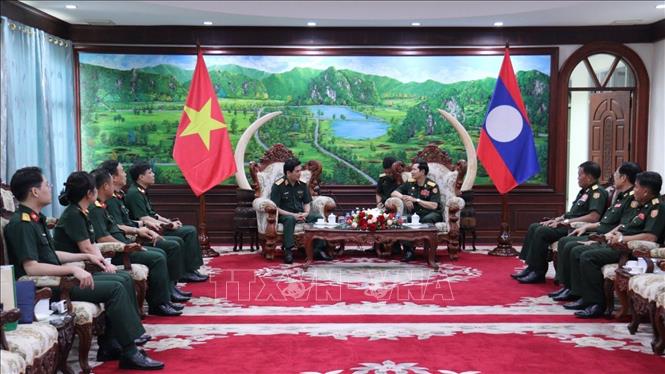 Quang cảnh buổi làm việc giữa Đoàn công tác Học viện Quân y Việt Nam và Lãnh đạo Bộ Quốc phòng Lào. Ảnh: Xuân Tú – PV TTXVN tại Lào