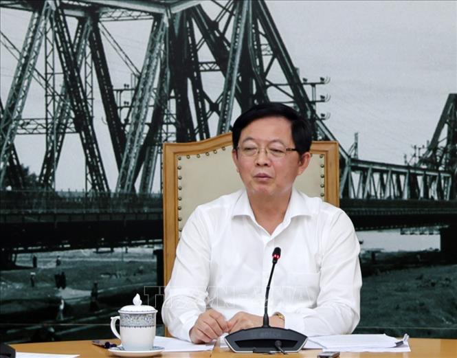 Phó Thủ tướng Hồ Quốc Dũng chủ trì cuộc họp nhằm họp giải quyết vướng mắc liên quan đến thu hồi đất của Tổng Công ty Giấy Việt Nam trên địa bàn tỉnh Phú Thọ. Ảnh: TTXVN phát