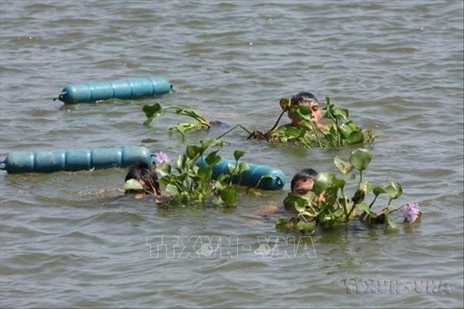 Đặc công hải quân thường xuyên huấn luyện thể lực, rèn luyện sức chịu đựng bền bỉ, dẻo dai trên sông, trên biển; kết hợp huấn luyện với rèn luyện kỷ luật, xây dựng chính quy, ý thức chấp hành mệnh lệnh, kỷ luật chiến trường. Ảnh: Trọng Đức - TTXVN