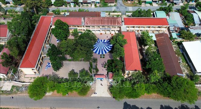 Trường Tiểu học Phạm Hùng là một trong những cơ sở được sắp xếp theo phương án tổ chức lại mạng lưới trường các cơ sở giáo dục công lập trên địa bàn tỉnh. Ảnh: Giang Phương - TTXVN