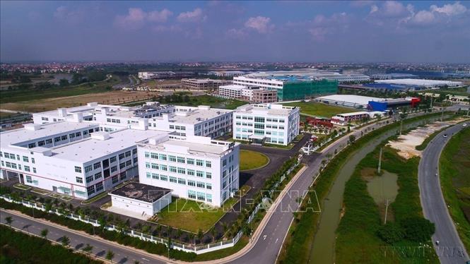 Tỉnh Bắc Ninh hiện có 39 khu công nghiệp được phê duyệt chủ trương đầu tư với tổng diện tích khoảng 11.524 ha, trong đó 8.151 ha là đất dành cho công nghiệp, công nghệ thông tin và dịch vụ hành chính. Trong ảnh: Khu công nghiệp Hòa Phú – Khu công nghiệp đầu tiên ở Hiệp Hòa (Bắc Giang cũ). Ảnh: Việt Hùng – TTXVN