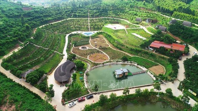 Điểm du lịch sinh thái cộng đồng Vạn Hoa Hồ Va tại xã Đông Phú (Bắc Ninh). Ảnh: Việt Hùng - TTXVN