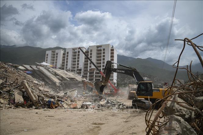 Đống đổ nát sau động đất tại bang La Guaira, Venezuela. Ảnh: THX/TTXVN phát