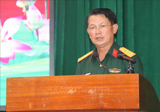 Đại tá Nguyễn Minh Tấn, Phó Chính ủy Bộ Chỉ huy Quân sự tỉnh Tây Ninh, phát biểu tại hội nghị. Ảnh: Đức Hạnh - TTXVN