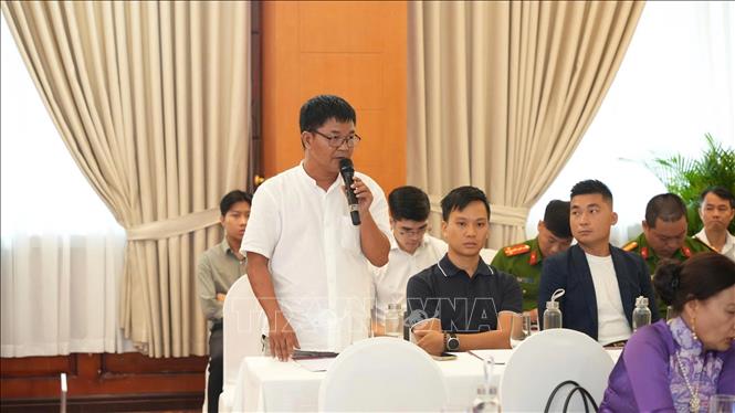 Doanh nghiệp trao đổi, nêu kiến nghị tại buổi đối thoại. Ảnh: Văn Dũng - TTXVN