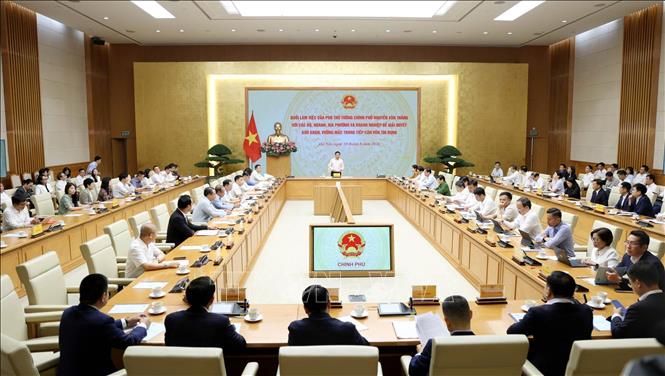 Phó Thủ tướng Nguyễn Văn Thắng họp về giải quyết khó khăn, vướng mắc trong tiếp cận vốn tín dụng. Ảnh: Xuân Tùng - TTXVN