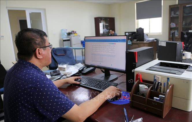 100% hoạt động chuyên môn của hệ thống bảo hiểm xã hội Hải Phòng triển khai trên môi trường số. Ảnh: Minh Thu- TTXVN