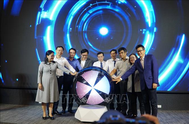 Các đại biểu thực hiện nghi thức khởi động chương trình. Ảnh: Thu Hoài - TTXVN