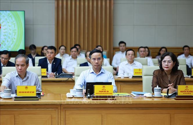 Lãnh đạo Quốc hội và Ngân hàng Nhà nước tham dự buổi làm việc. Ảnh: Dương Giang – TTXVN 
